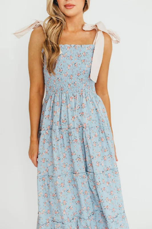 Midi dresses with ruffled bodices for a more pronounced feminine look Cora Smocked Bow Tie Strap Maxi Dress in Blue Midi dresses with ruffled bodices for a more pronounced feminine look Cora Smocked Bow Tie Strap Maxi Dress in Blue