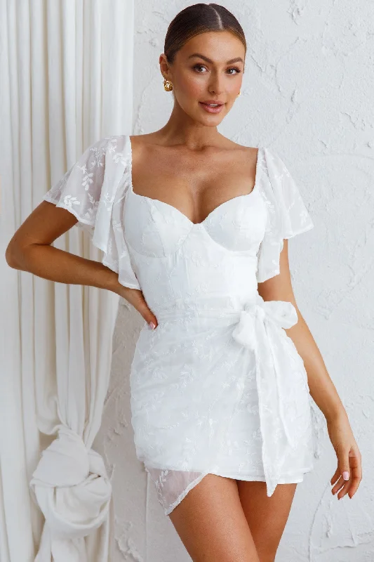 Ruffled Women Dress with Multiple Layers for a Playful and Girly StyleAphrodite Molded Bust Angel Sleeve Wrap Dress Embroidered White Ruffled Women Dress with Multiple Layers for a Playful and Girly StyleAphrodite Molded Bust Angel Sleeve Wrap Dress Embroidered White