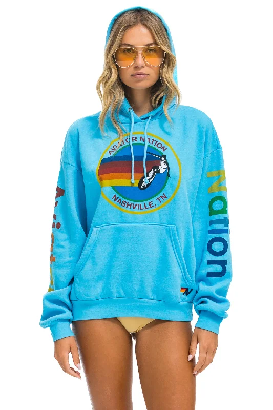 Women's zip - front sweatshirt with contrast stitching for a sporty aestheticAVIATOR NATION NASHVILLE RELAXED PULLOVER HOODIE - NEON BLUE Women's zip - front sweatshirt with contrast stitching for a sporty aestheticAVIATOR NATION NASHVILLE RELAXED PULLOVER HOODIE - NEON BLUE