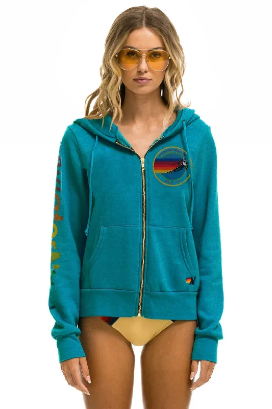 Women's pullover hoodie with a side slit for a modern and relaxed fitAVIATOR NATION VAIL ZIP HOODIE - TEAL