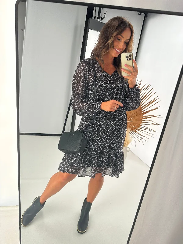 Sleeveless Women Dress in Bright Colors for Summer PartiesGloss by Shine On Laura Hem Tier Dress Black Geo Print Sleeveless Women Dress in Bright Colors for Summer PartiesGloss by Shine On Laura Hem Tier Dress Black Geo Print