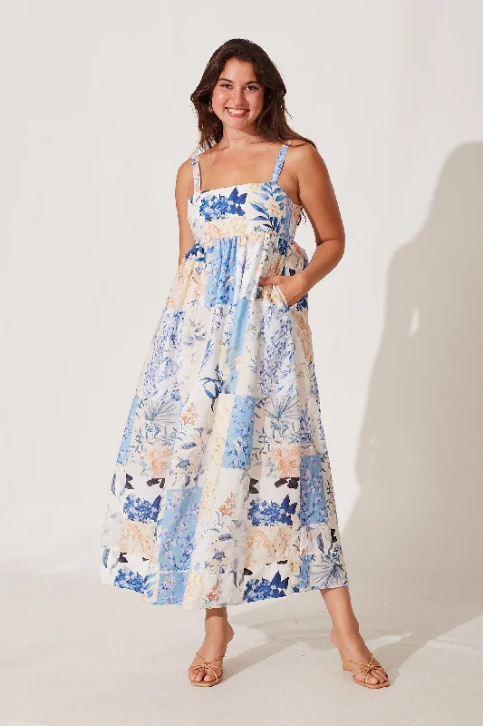 Midi dresses with empire waists for a flattering maternity optionAngelica Midi Sundress In Blue With Cream Patchwork Floral Print Midi dresses with empire waists for a flattering maternity optionAngelica Midi Sundress In Blue With Cream Patchwork Floral Print