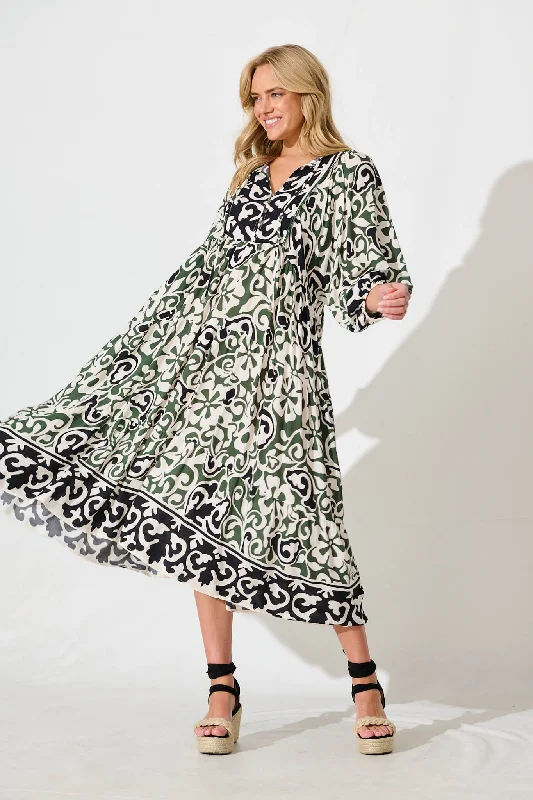 Midi dresses with keyhole backs for a flirty and unexpected detailBarrymore Midi Smock Dress in Black and Green Print