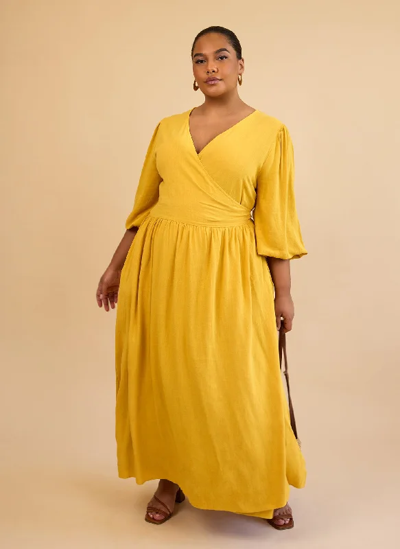 Midi dresses with pleated skirts for a timeless and elegant appealBette Linen Ballon Sleeve Maxi A Line Dress Midi dresses with pleated skirts for a timeless and elegant appealBette Linen Ballon Sleeve Maxi A Line Dress