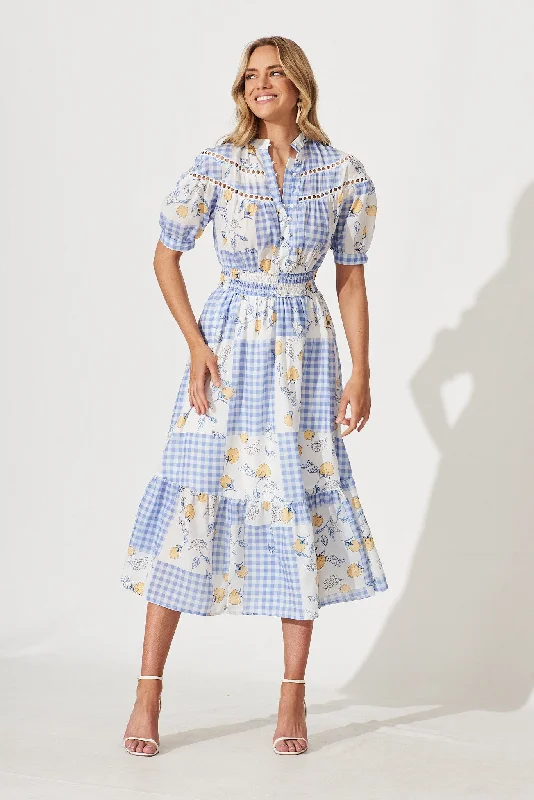 Midi dresses with keyhole backs for a flirty and unexpected detailLynette Midi Dress In Blue Gingham Check With Lemon Patch Print Midi dresses with keyhole backs for a flirty and unexpected detailLynette Midi Dress In Blue Gingham Check With Lemon Patch Print