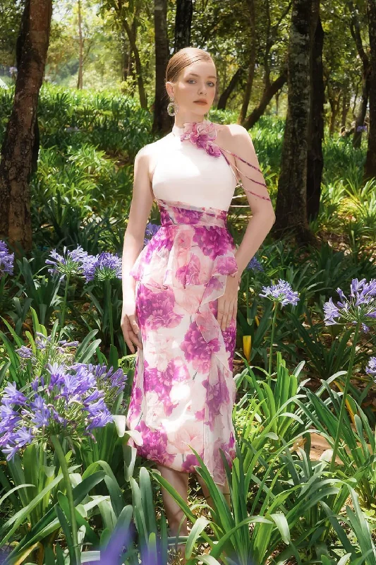 Midi dresses with keyhole backs for a flirty and unexpected detailNobile Peplum Halter Neck Voile Midi Dress