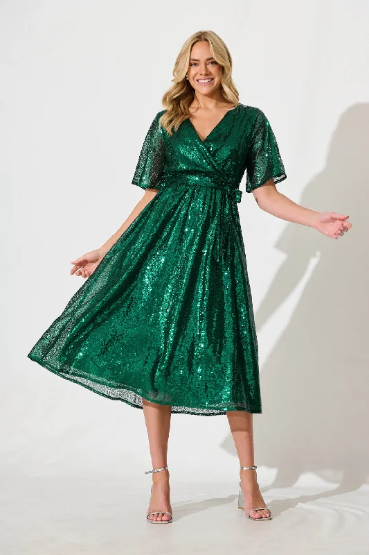 Midi dresses with ribbed textures for a unique and tactile appearancePRE ORDER Winslet Midi Dress In Emerald Green Sequin Midi dresses with ribbed textures for a unique and tactile appearancePRE ORDER Winslet Midi Dress In Emerald Green Sequin