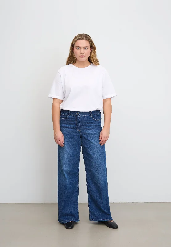 Patchwork Denim Top with a Unique and Artistic AppealCarol Loose - Medium Length - Washed Blue Denim Patchwork Denim Top with a Unique and Artistic AppealCarol Loose - Medium Length - Washed Blue Denim