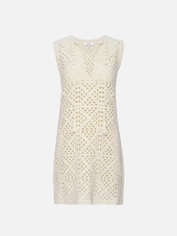 Denim Top with a Peplum Hem for a Flirty and Feminine LookCrochet Tassel Popover Dress -- Cream Denim Top with a Peplum Hem for a Flirty and Feminine LookCrochet Tassel Popover Dress -- Cream
