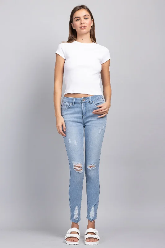 Fringed Denim Top with a Bohemian FlairDistressed Mid Rise Skinny Jeans