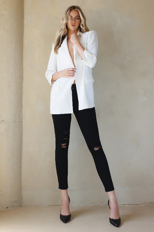 High Rise Destructed Skinny Jeans