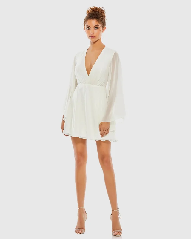 Linen mini dresses for a breathable summer optionSolid Flowy V Neck Illusion Sleeve Mini Dress Linen mini dresses for a breathable summer optionSolid Flowy V Neck Illusion Sleeve Mini Dress
