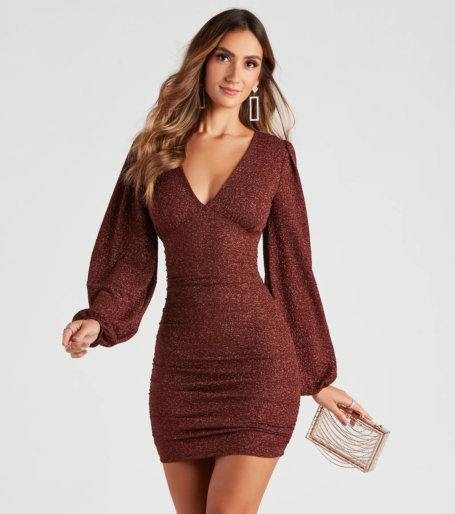 Bodycon dress with a cut - out detail for a sexy appeal​Get Glitzy Glitter Knit Bodycon Mini Dress