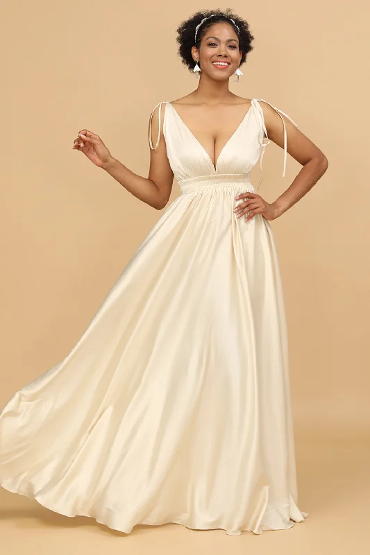 Wedding guest dresses with tiered skirts for a feminine lookIvory Deep V-Neck Backless Long Bridesmaid Dress Wedding guest dresses with tiered skirts for a feminine lookIvory Deep V-Neck Backless Long Bridesmaid Dress
