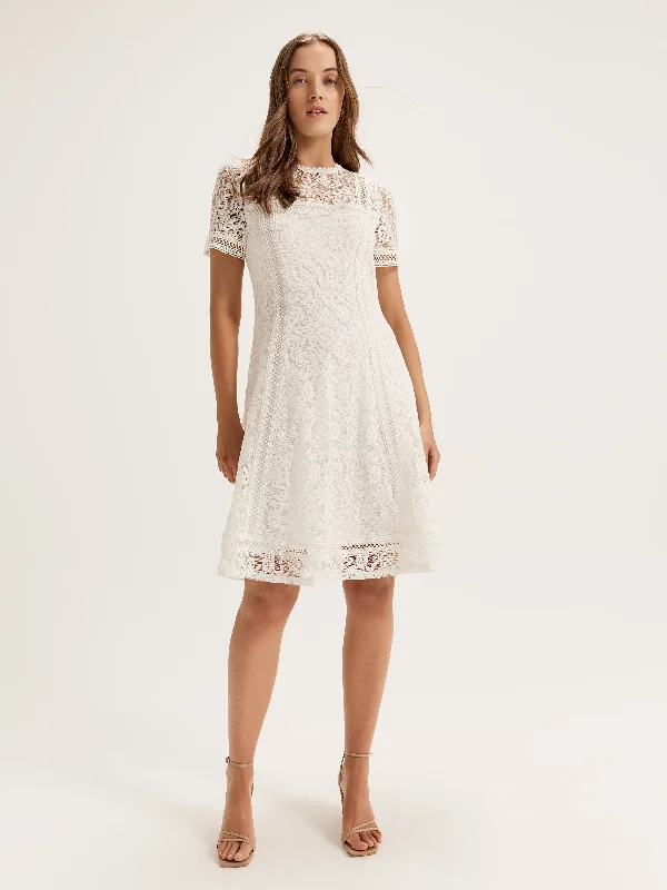 Mini cocktail dresses with a beaded bodice and a flirty A - line skirtLacie Dress
