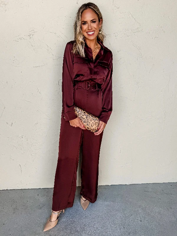 Wedding guest dresses with cut - out details and midi lengthsMake An Impression Satin Jumpsuit Wedding guest dresses with cut - out details and midi lengthsMake An Impression Satin Jumpsuit